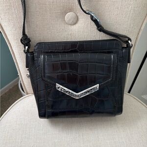 Vintage Brighton leather bag with 3 inside & 6 outside pockets. CC slots. Ex con